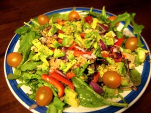 Mesclun, herbs, arugula, spinach adorned with avocado, tofu, red pepper, purple onions, and sungold cherry tomatoes. Now that's one big winter salad!
